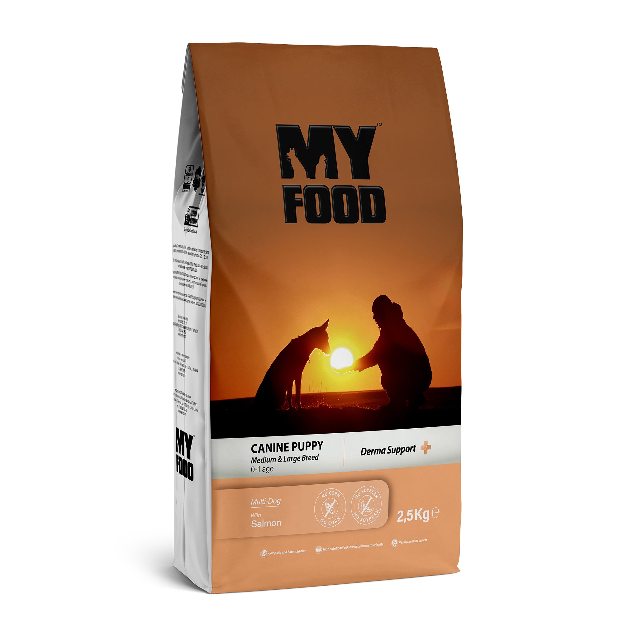A bag of MyFood brand dry dog food for canine puppies, with an image of a puppy and a sunset in the background.